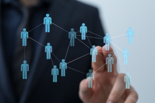 Business professional visualizing digital connections of a network, internet connection concept.