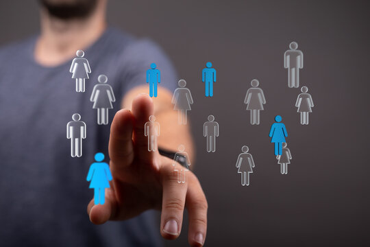 Hand pointing at a digital social network of people. Modern, innovative and social media concept.