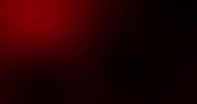 Black dark red crimson scarlet burgundy maroon abstract background video. Smooth gradient ombre fade with subtle shadows and soft glow. Minimal elegant backdrop loop for motion graphics, presentations