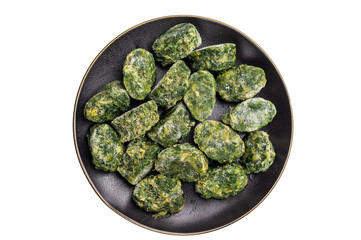 Green, icy spinach portions ready for cooking, served in a rustic black bowl. Concept of healthy eating and food storage.