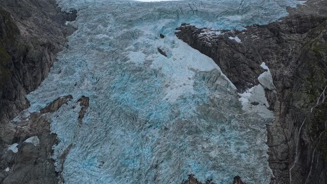 Melting Boyabreen Glacier seen from above as climate change alters Norwegian landscape