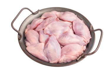 Fresh raw quail breasts (skin-on) arranged in a round metal pan, isolated on a white background. Ready for cooking.