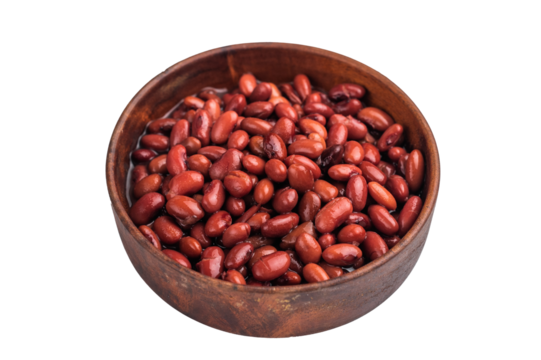 Red kidney beans in a natural wooden bowl on a bright white background. Healthy, protein-rich vegan food. Overhead.