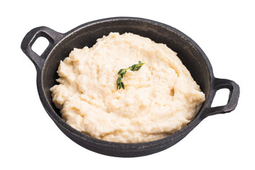Creamy horseradish sauce in a rustic black cast iron bowl, garnished with a fresh sprig of thyme. Isolated on white background.
