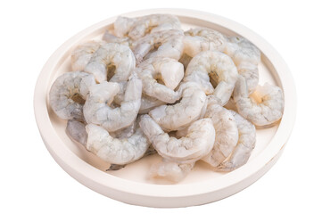 Raw peeled shrimp prawn with fresh thyme on a white plate. High Key top view of a healthy protein ingredient for cooking.