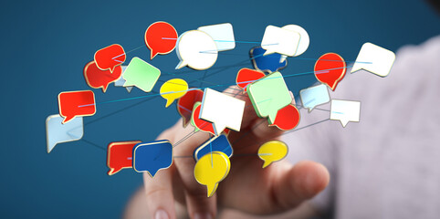 Abstract image of hand holding network of connected speech bubbles, ideal for representing online...