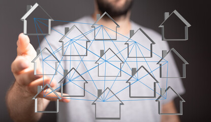 Conceptual image of a hand connecting house icons, representing real estate, housing network, and community connection. Ideal for illustrating p