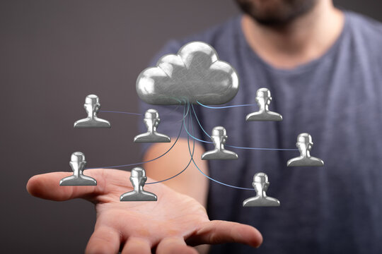 Hand holding cloud connection with icons of people, networking concept and data storage, team and innovation.