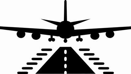 Commercial airplane descending towards runway lights, ready for landing.