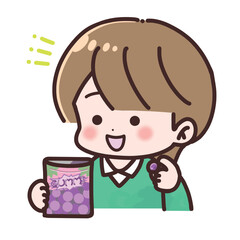 グミを食べるかわいい子ども