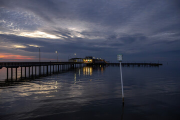 Fototapeta premium The Fairhope Municipal Pier at sunset