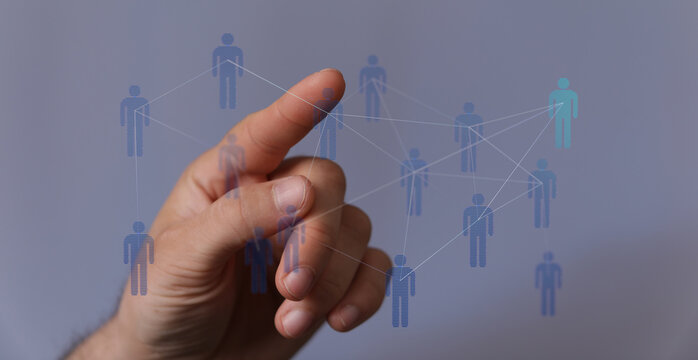 Hand touching network of people, concept of social connections and technology. Teamwork and collaboration. - Powered by Adobe