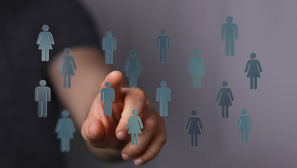 Hand pointing at floating social media icons, symbolizing networking, connection, and online communities. Great