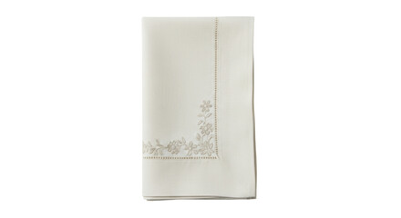 Isolated folded linen tablecloth with beige embroidered floral pattern border design