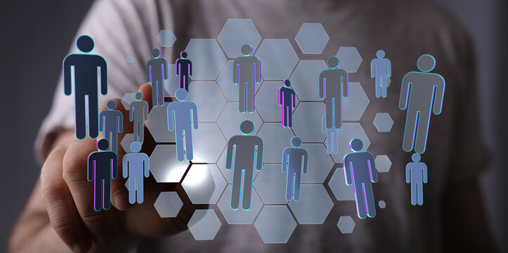 Abstract business concept of a person touching a digital network with silhouettes representing people, connecti