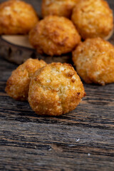 sweet cookies with coconut pieces are on the table, a group of delicious freshly made cookies for a tea party