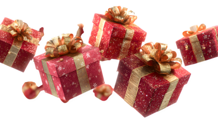 Festive flying red and gold gifts with ribbons and decorations, perfect for Christmas or birthday celebration theme isolated on white background