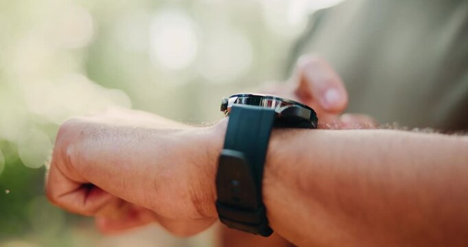 Hands, man outdoor or smart watch with fitness app, tracking heart rate or exercise progress. Bokeh, person or scroll with tech in nature for workout results, wellness update or monitor step counter.