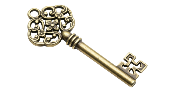 Isolated golden ornate antique key lies at an angle casting a shadow on a plain surface