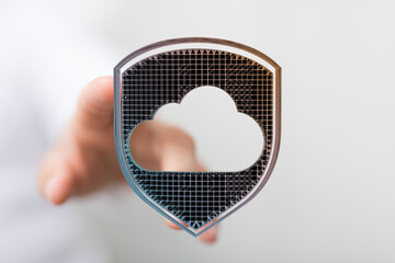 Secure cloud data storage represented by a hand holding shield icon. Protect your online...