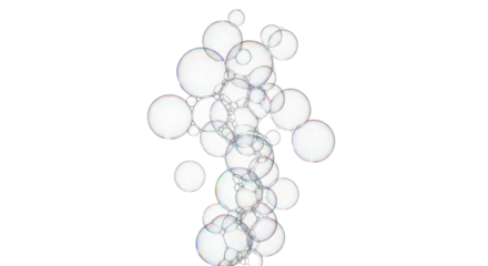 Isolated arrangement of soap bubbles floating in the air, shimmering with iridescent color