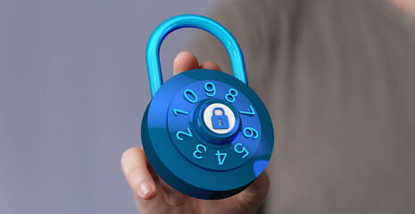 Close up shot of a hand holding a blue padlock. Represents data protection, cybersecurity, and...