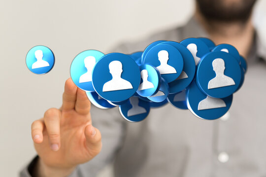 Hand touching user icons representing networking, connection, global community and digital communication. Social media concept, teamwork and peo