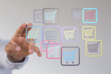 Hand reaching towards digital shopping cart icons, symbolizing online shopping, e-commerce, and digital retail. Perfect for illustrating buying,