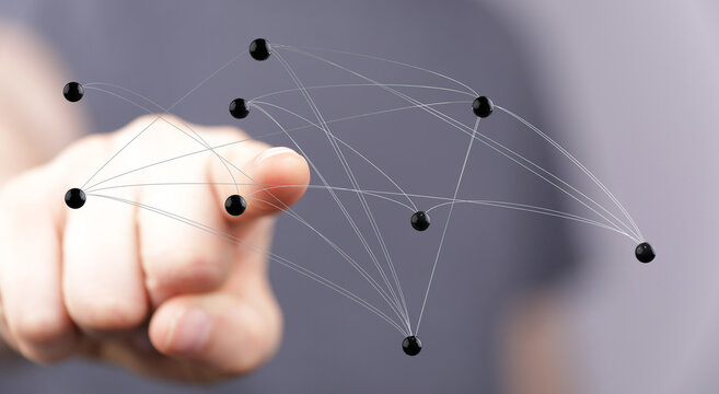 Close-up of a hand touching a network of connected nodes representing data flow and digital interaction. Demons
