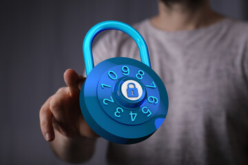 Hand holding a digital padlock concept. Symbol of security, safety, and protection in the digital...