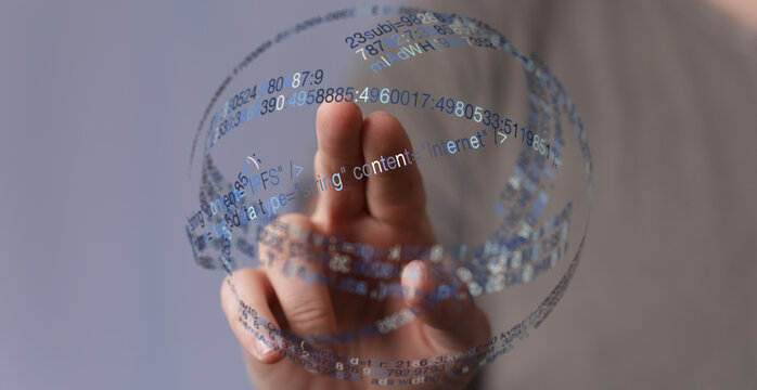 Hand touching digital globe symbolizing network and online data. Represents internet, technology, cloud computing, and communication.