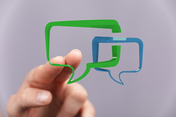 An artistic representation of communication and dialogue concepts, featuring speech bubbles, connections, and d