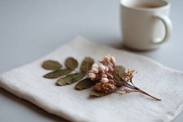 handcrafted christmas card rests elegantly on linen napkin embodying essence of holiday magic