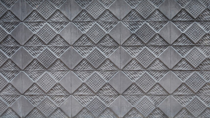 Black tile wall background with square pattern. For graphic design, 3D rendering and banners