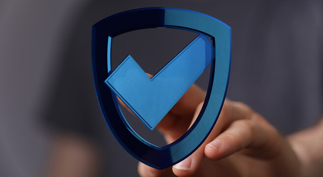 Close-up of a hand with a digital shield icon with a check mark, representing concepts like data protection and internet security. - Powered by Adobe