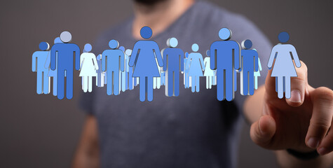 A hand interacting with a digital interface, featuring people icons illustrating teamwork, community, and social connection. Ideal for business,