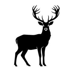 Fototapeta premium Silhouette of a stag with large antlers standing in profile 