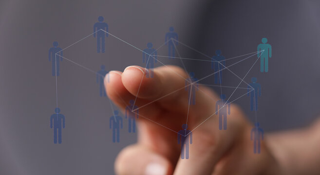 Hand touching digital network graphic. Illustrating social connection, networking, global communication and peo
