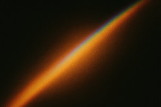 Light leak band crossing the frame diagonally, rainbow fringe along the edge, dark surround, subtle film grain.