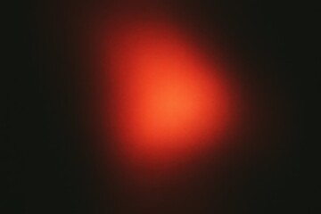 Warm red light bleeding into dark blurred tones, matte grain texture, abstract analog glow.