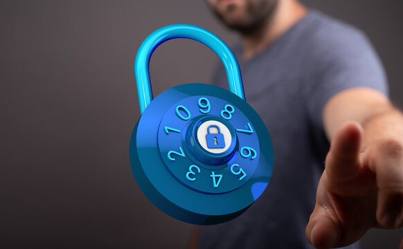 Concept of cybersecurity, data protection and safety with a man interacting with a virtual digital padlock on a