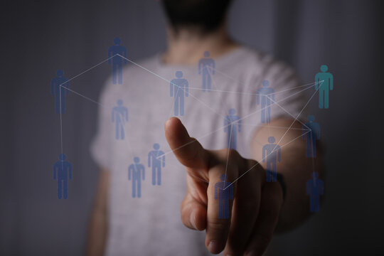 Man touching virtual human icons, connection network, business concept, technology and digital concept, future. - Powered by Adobe