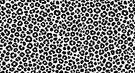Seamless black and white leopard print pattern background texture design.