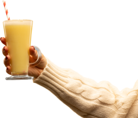 Hand lifting creamy yellow drink with striped straw in soft knit sleeve on transparent background. Concept of gentle winter comfort, festive beverage promotion, and warm lifestyle content.