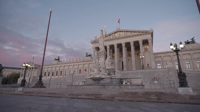Austrian Parliament and Pallas Athene Fountain at Dusk , Vienna Austria Landmarks with Horse Tamer Statues