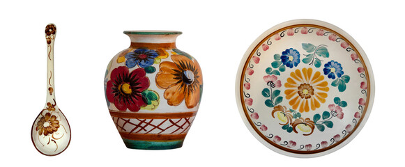 Painted ceramic plate, spoon and vase isolated on white background