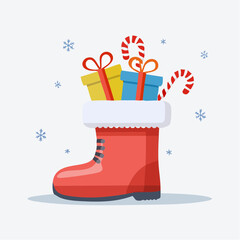 Red Christmas Boot Filled with Festive Gifts and Candy Canes.