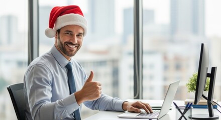 Caucasian male adult in santa hat giving thumbs up at office desk