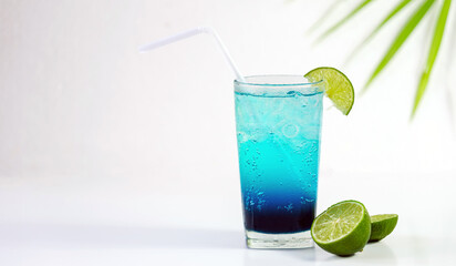 Blue Hawaiian Drink with lime, Blue hawaii cocktail on white  background
