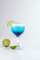 Blue Hawaiian Drink with lime, Blue hawaii cocktail on white  background